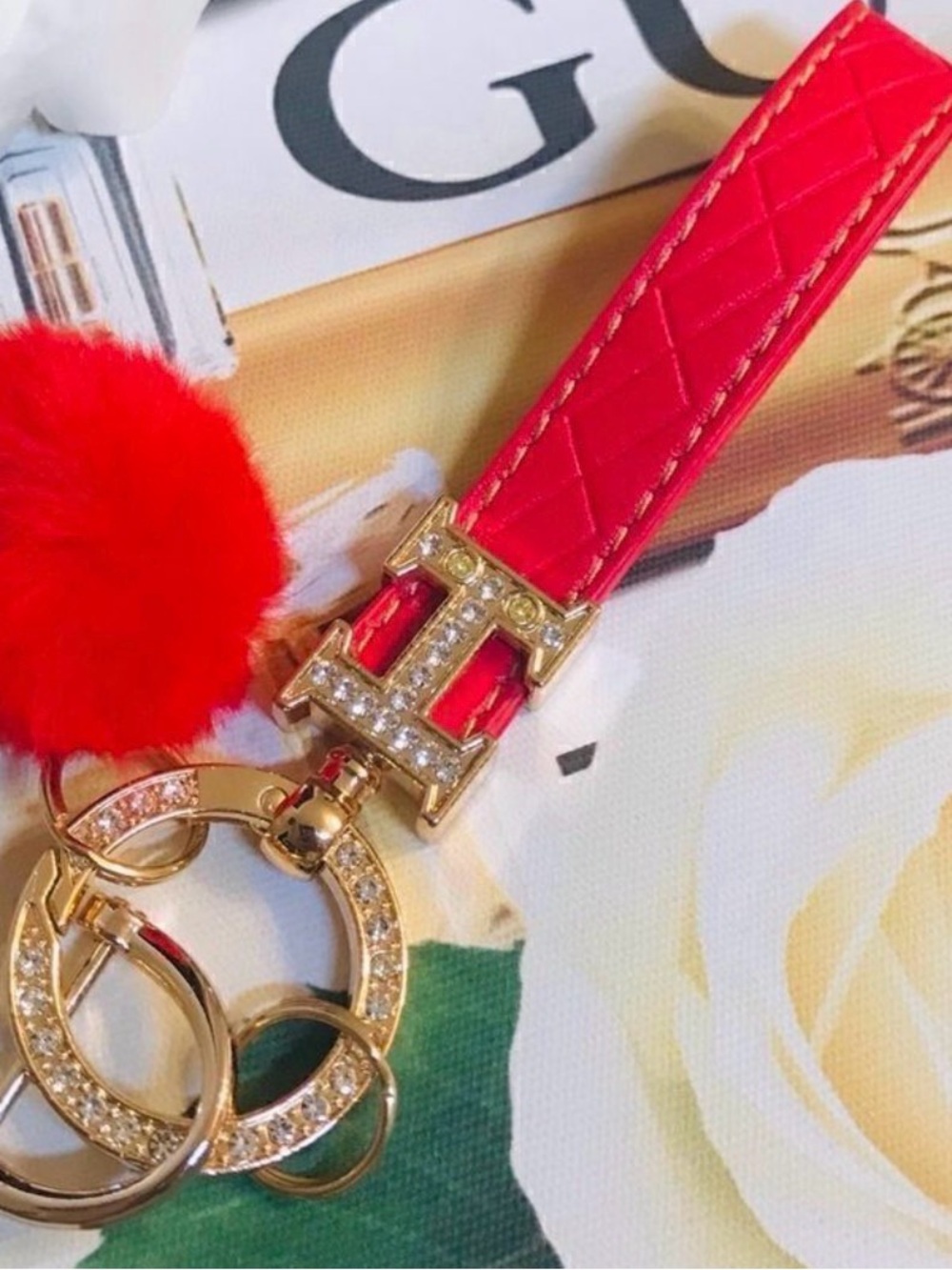 Luxury Red Quilted Strap Keychain with Gold Crystal Hardware